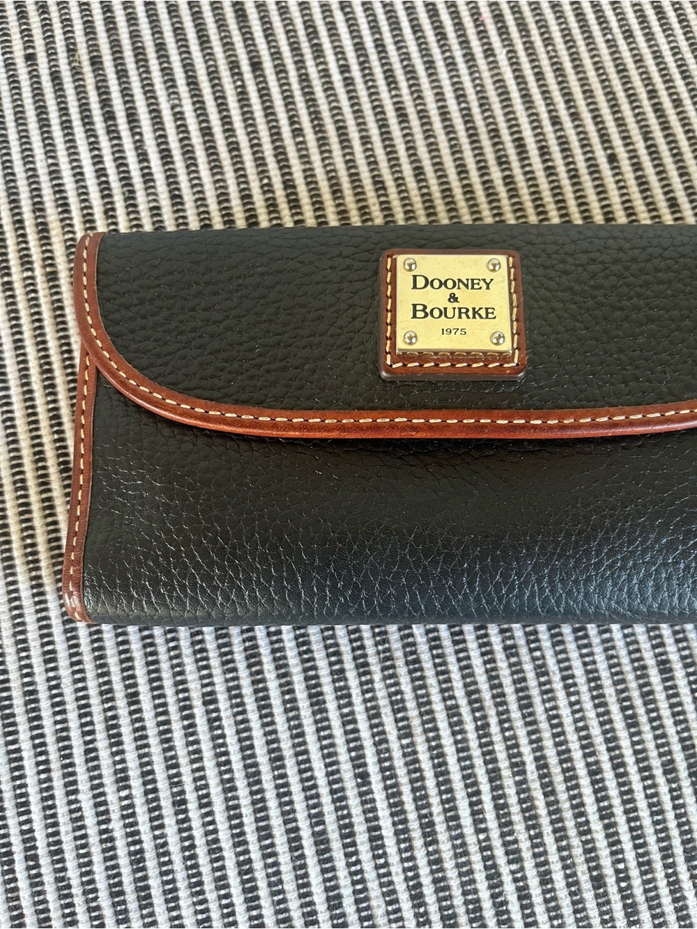 Dooney & Bourke Black Pebble Leather Wallet with Brown Trim